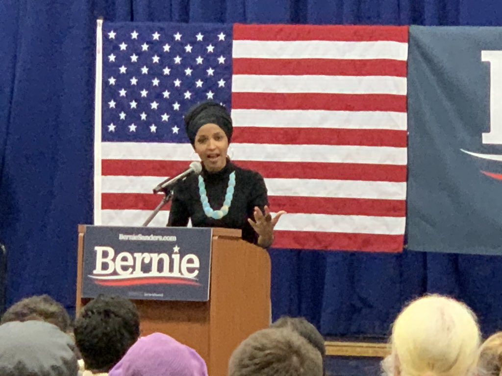 dughi's tweet photo. Ilhan Omar opened for Bernie Sanders at SNHU in Manchester https://t.co/0u3LqFeXoU