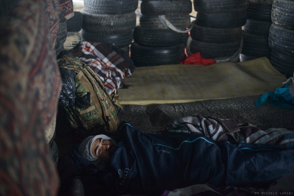A #migrant from #Morocco rest inside an abandoned factory in #VelikaKladusa in #Bosnia. Hundreds of #migrants are stranded at the #border with #Croatia due to violent #pushback perpetrated by the Croatian #Police 

#workinon #reportage #photojournalism #fotogiornalismo #migration