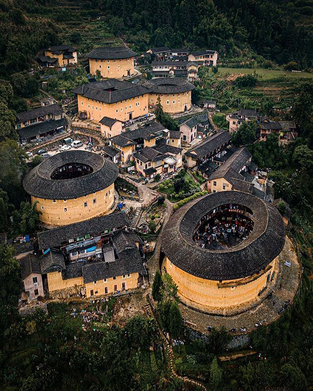 I woke up very early to see the first light on these architectural wonders of southeast China. These collective housing are almost 800 years old! 🏡⛰🌾 #China #folkscenery #roamtheplanet #drone #voyaged #beautifuldestinations #travelawesome #earthpix #artofvisuals #agameoftone…