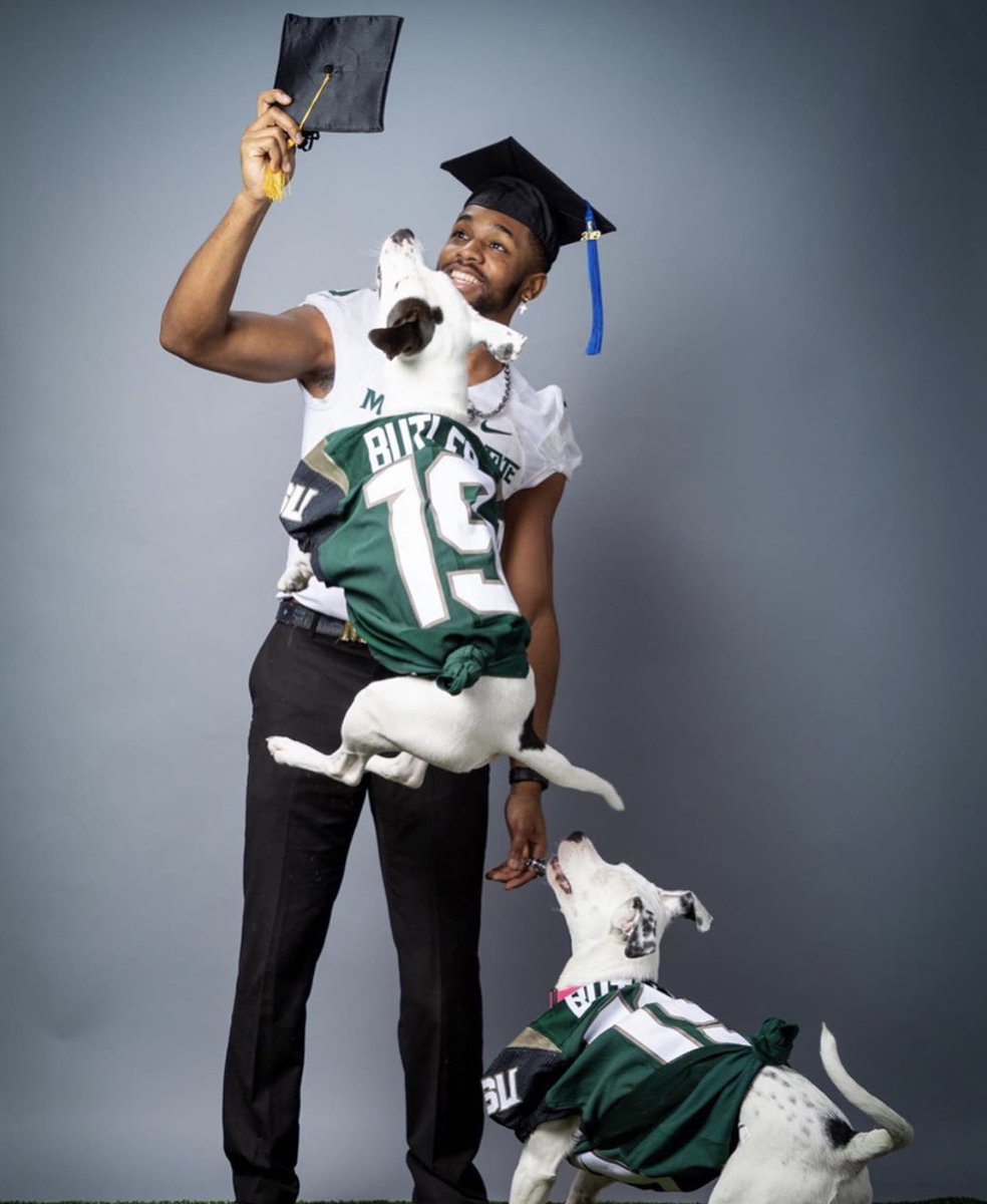 AlexNBCLA's tweet image. Michigan State Football player and #Dallas native @JoshButlerTv made news a few weeks back when he walked out with his dogs on senior day. His dad passed away in 2017, his mom died earlier this year. 

Today he graduated with a masters degree. His dogs made the grad pics too!