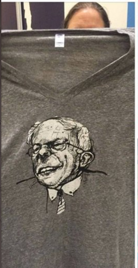 momforprogress's tweet photo. Speaking of anti-semitism, this is the ONLY Bernie T-shirt sold at the 2016 Dem Convention, in the official gift shop. I know this wasn't his campaign merch: WHO "designed" this shirt? Who green lit it? @DNC @donnabrazile  @TomPerez Who DENOUNCED it? Anyone? #FirstJewishPresident https://t.co/kkqlCXLOUJ