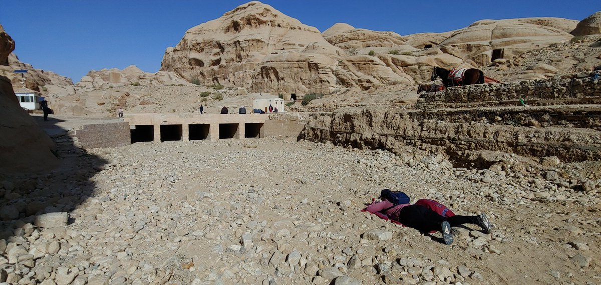 caseallen's tweet photo. When the historic photo you're trying to repeat had a viewshed a couple meters lower 100 yrs ago because the stream bed has agraded (filled-in/raised), squatting isn't enough. You dig-in & get dirty! Literally. @facesfieldwork #Fieldwork #Petra #JordanIsSafe 🇯🇴 @GroomKaelin https://t.co/SP6n8NVLYi