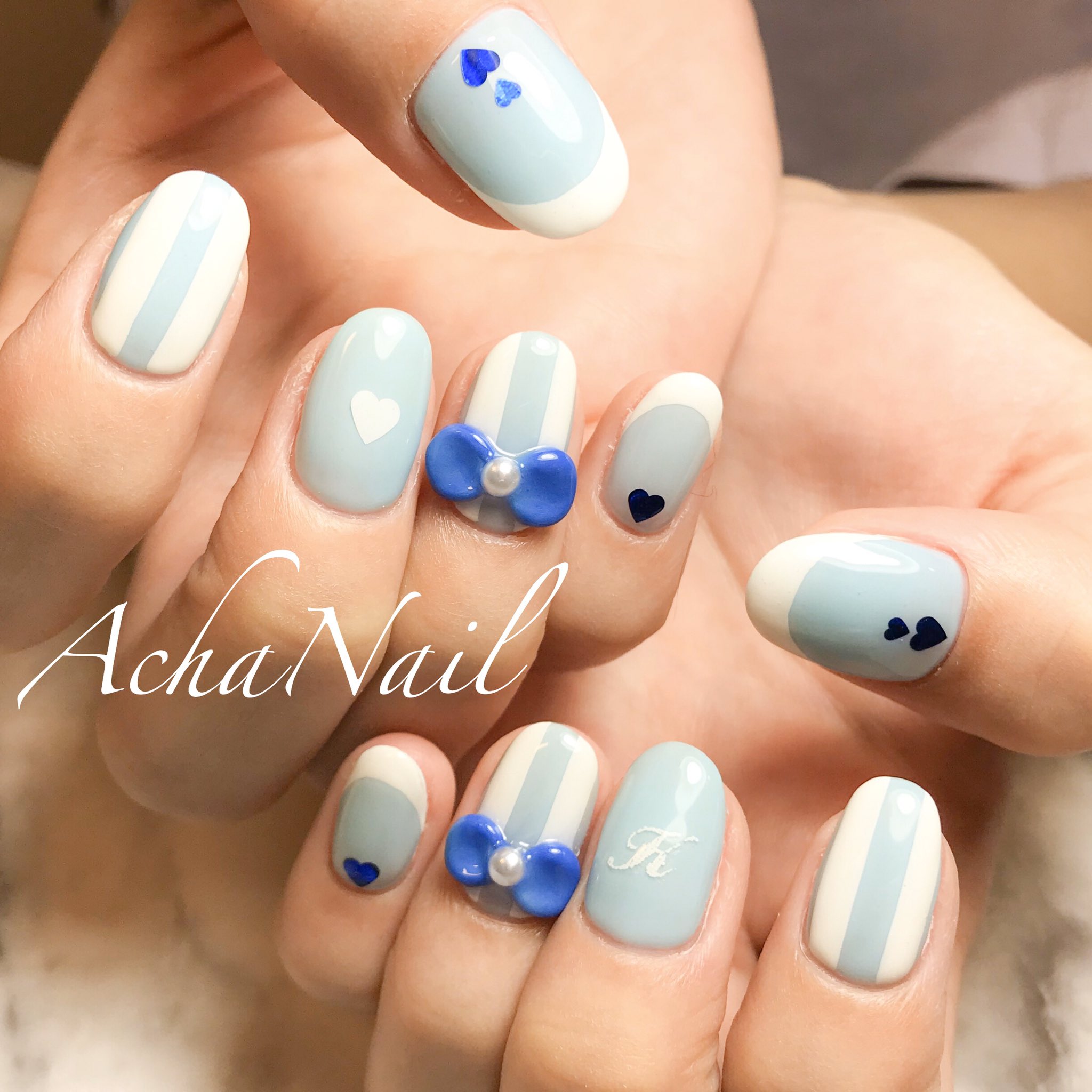 池袋ネイルサロンachanail ベイビーブルーのガーリーネイル T Co Imaauvhhv3 水色ネイル りぼんネイル 3dネイル ガーリーネイル ストライプネイル イニシャルネイル 推しネイル ベイビーブーマー ネイル ジェルネイル