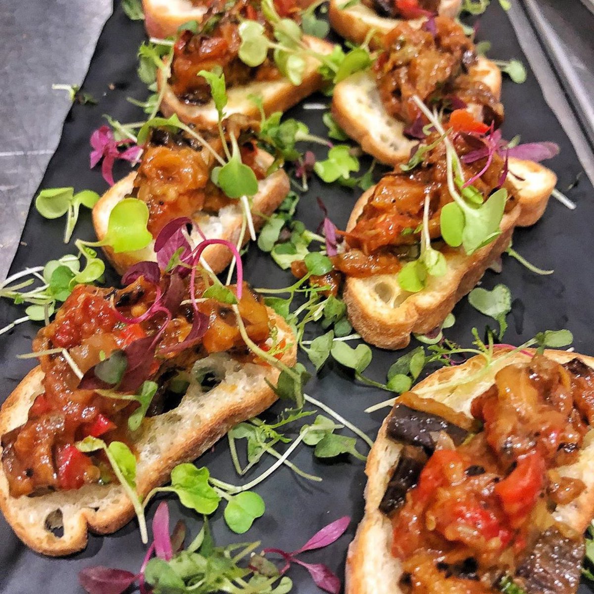 BerettaKitchen's tweet photo. Charred Eggplant Bruschetta! 😍

Learn more about our offerings on our website. Link in bio! https://t.co/xyQDrRQuPL