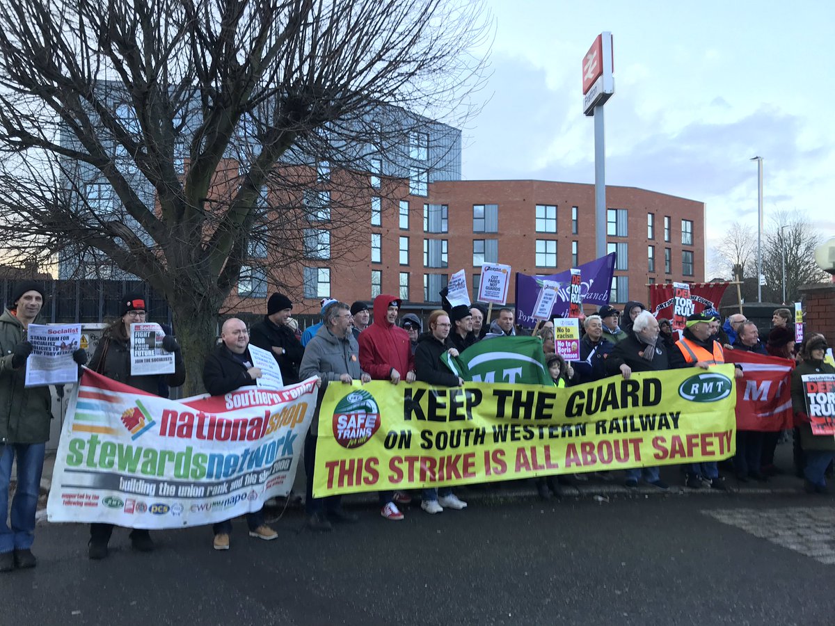 SouthernSP's tweet photo. Great rally with @RMTunion guards on @SW_Help who are striking for safety on our trains. Full support from us all @NSSN_AntiCuts and @Socialist_party #FightTilWeWin
#keeptheguardonthetrain
#safetybeforeprofits
#defendtradeunionrights @The_TUC https://t.co/54xa1aFw65