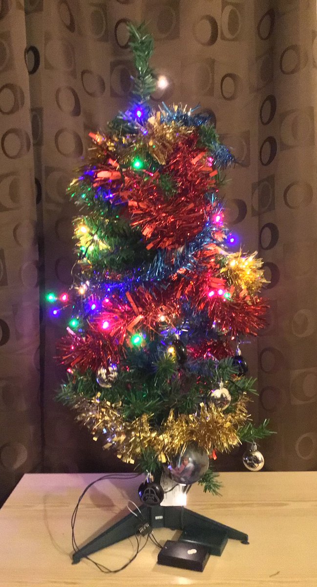 Christmas tree with tinsel and lights