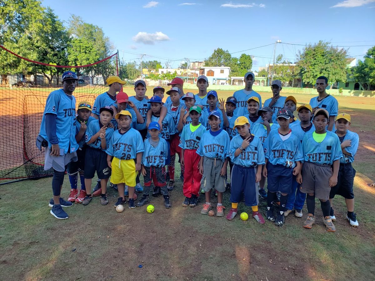 Dominicanbball's tweet photo. Dominican kids with uniforms donated by @tuftsbaseball during their trip to the Dominican Republic #baseballtrip #pelotacaliente https://t.co/PNBO2CD4me