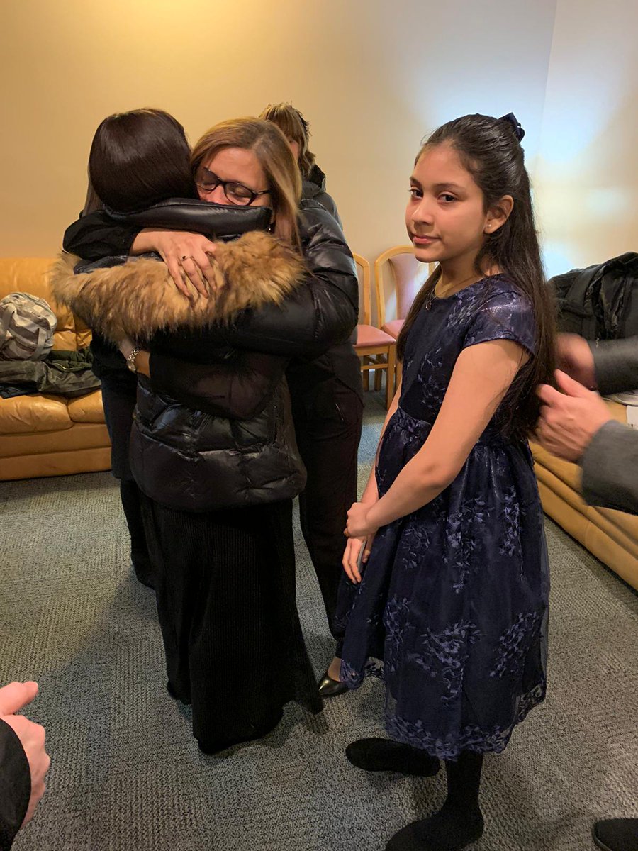 YosefRapaport's tweet photo. Libby Deutch (hugging Martha Freire Gutierrez) and @Cheskydeutsch of the Jersey City Hasidic Jewish community with @GovMurphy at memorial service for Douglas Gutierrez now #JerseyCityShooting https://t.co/2oP3FrVFBu