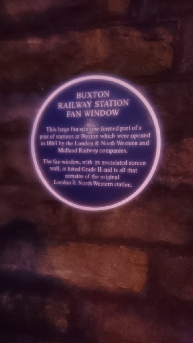 stephenlamppost's tweet photo. @RailwayHeritage I was just at Buxton station where the fan window has one of (I think) your blue plaques, saying the window is "all that remains" of the LNWR station. But the surviving station is the LNWR one, not the Midland one. Who is confused -- me or the plaque? https://t.co/M77vzBCXHN