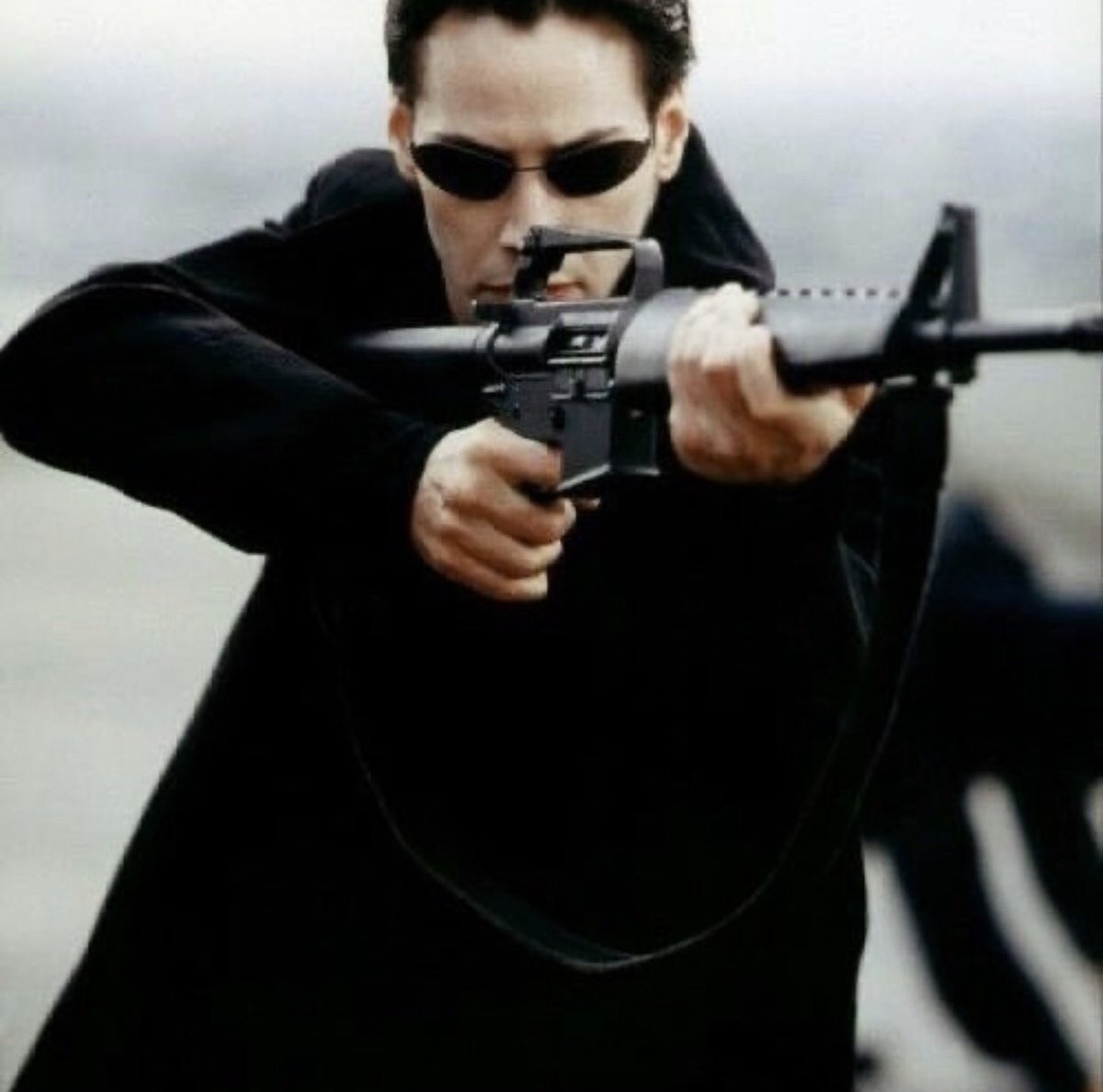 keanuuwickk's tweet photo. I have a thirst for Mr. Anderson holding guns https://t.co/h2nojlEEu1