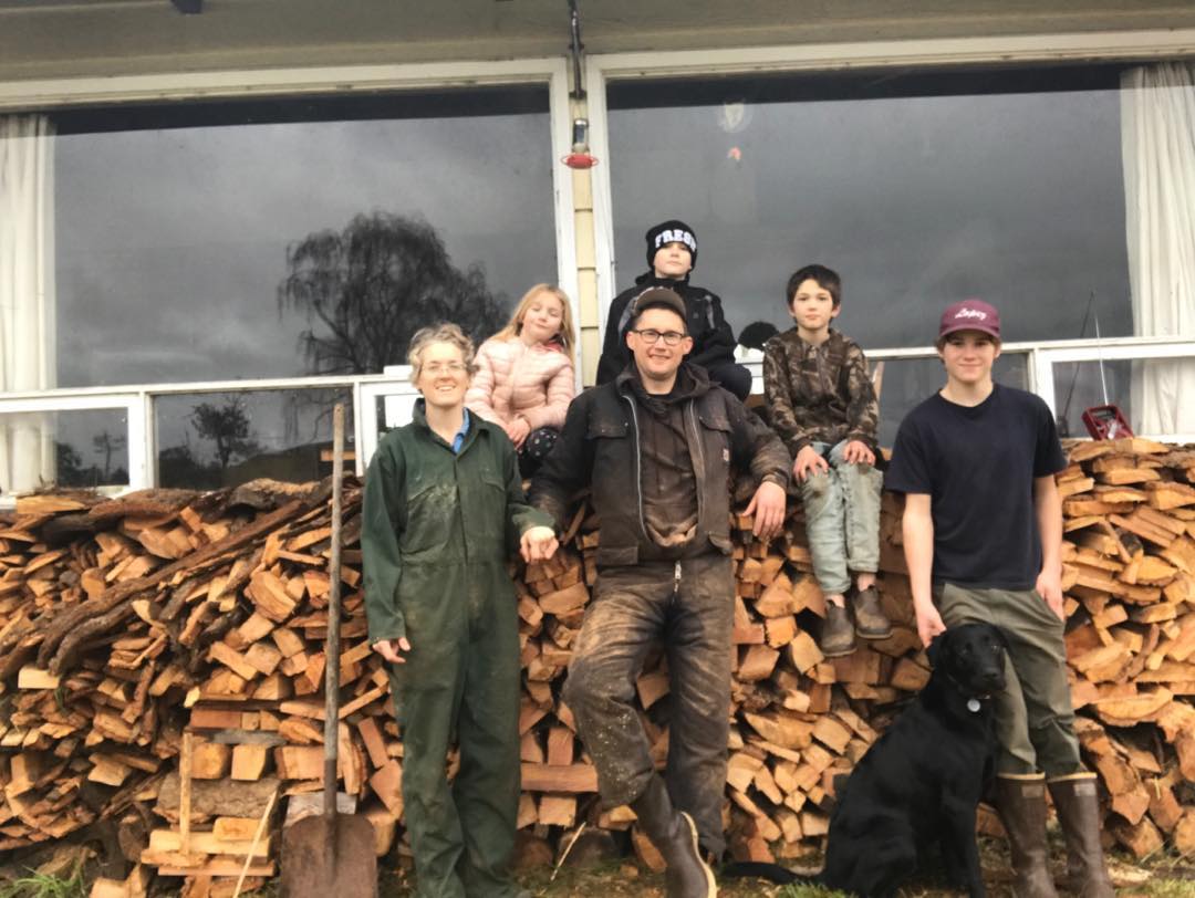 Happy Holiday's! Family Portrait after a day of stacking firewood #jonesfamilyfarms #jffarms #farmlife #firewood #islandfir