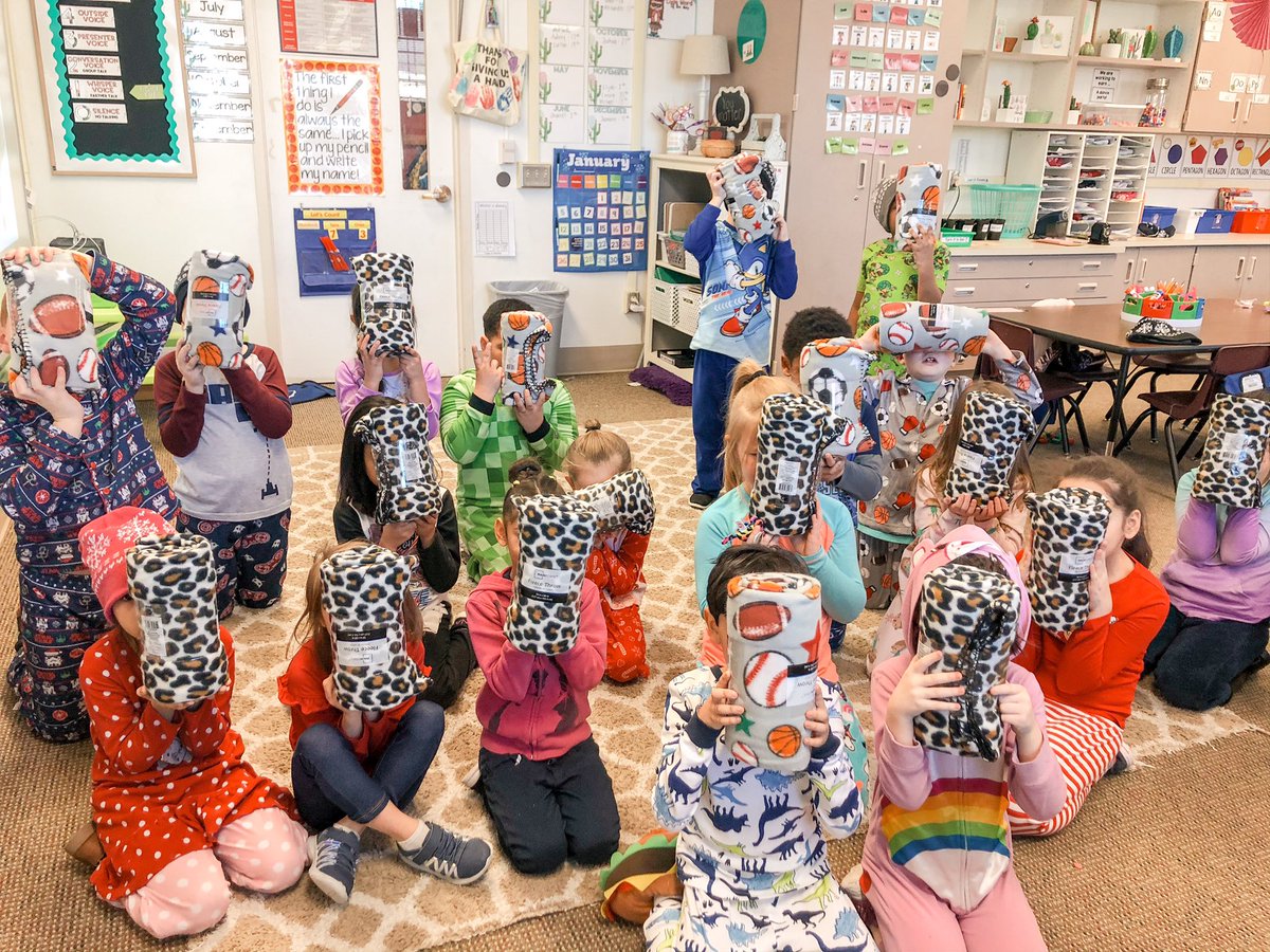 lmerbz's tweet photo. First graders receiving their blankets before going on Christmas break!! We talked about needs &amp; wants — they told me they needed warm blankets, so I bought them warm blankets ❣️ @HardingCedars #readersgrowcedars https://t.co/G1doj1kYsu
