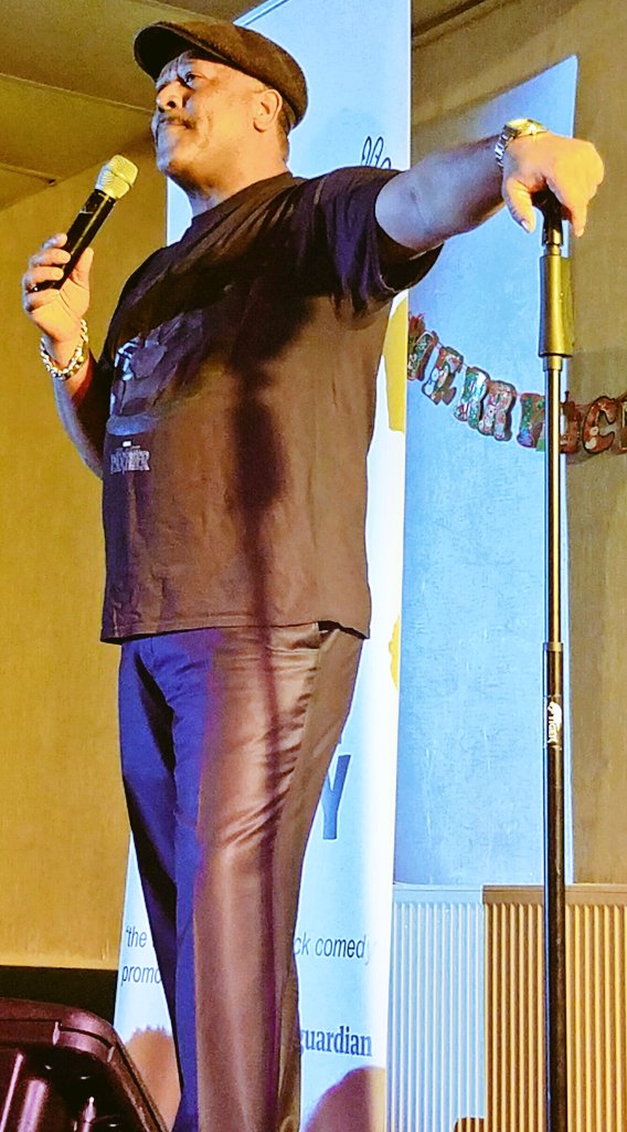 JSAssoc2014's tweet photo. Comedian Curtis Walker on stage talking about all things Jamaican and Brexit. #curtiswalker @CurtisWalkerDon @Doreen_Black1 @acci @sandrasamuels @Eleanor_SmithMP @CeliaHibbert @Stephie_S_C @nanadiko @Hunter1_lj @sebsmithcox #upfrontcomedy @JanetKayMusic @acci https://t.co/thqYS4sCrY