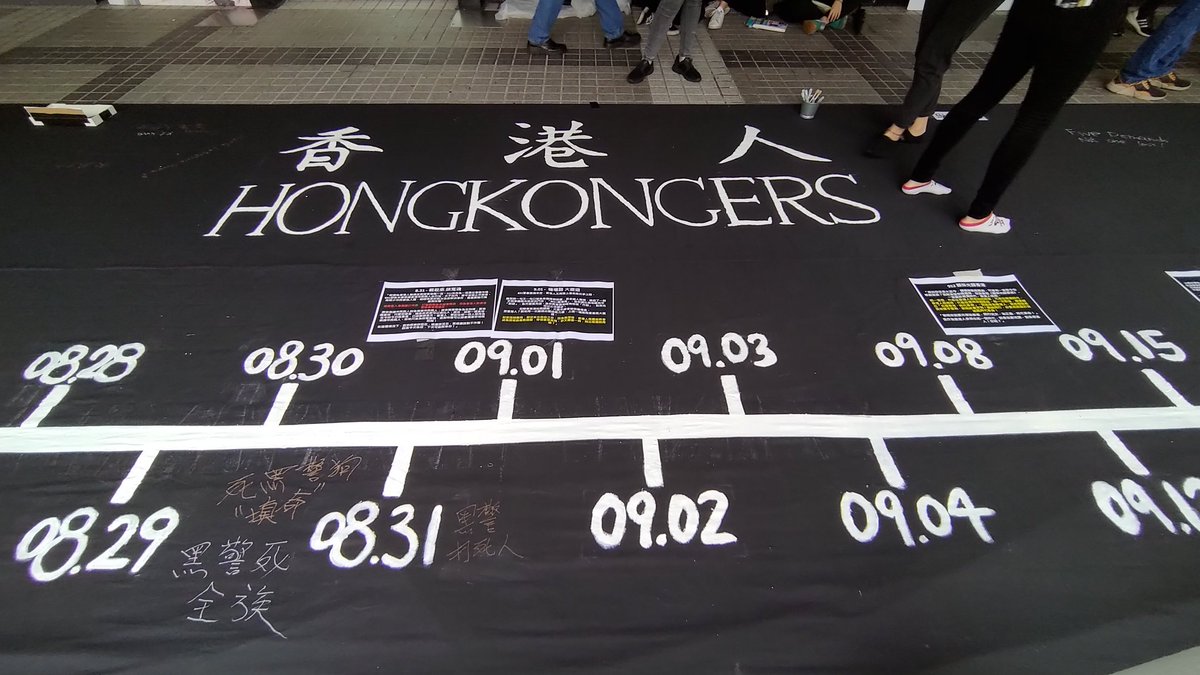 frances_sit's tweet photo. From "Hong Kongers Fighting" to "Hong Kongers March On", organisers of a rally at Edinburgh Place tdy prepared a 38m-long Lennon cloth, marked with major events of #HongKongProtests, which have lasted over 200 days now. https://t.co/3sZHkPSVTu