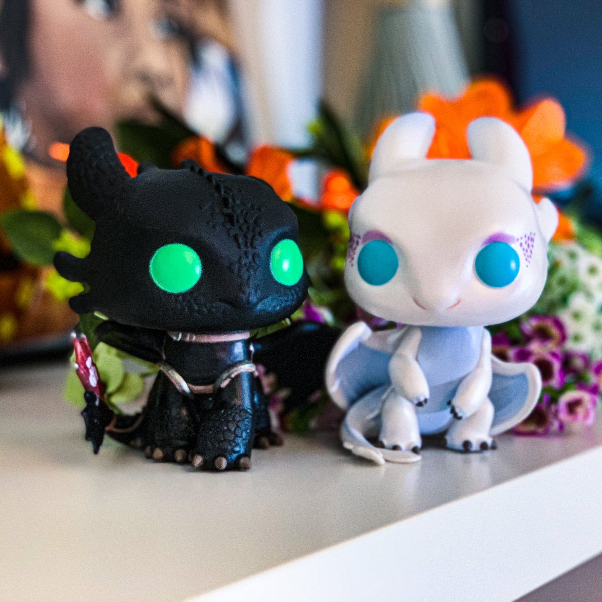 jenstreet's tweet photo. Almost forgot to post this! I received a second Night Fury from my best friend for my birthday. Since I already had the first, I was able to exchange it for a Light Fury. #ToothlessTesla #Toothless #NightFury #LightFury #HTTYD #howtotrainyourdragon https://t.co/XN2C3sf6W3