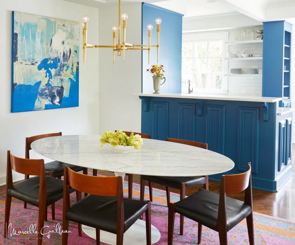 Eclectic elegance informed by simplicity of line. #Art #Brass #chandelier with #classicBlue cabinets. #RetroDiningTable #modern
#theSoulfulHome #NashvilleInteriorDesigner #vintage #midcenturyfurniture #midcenturydining #retrodining #retrodecor  #homesofig #eclectickitchen