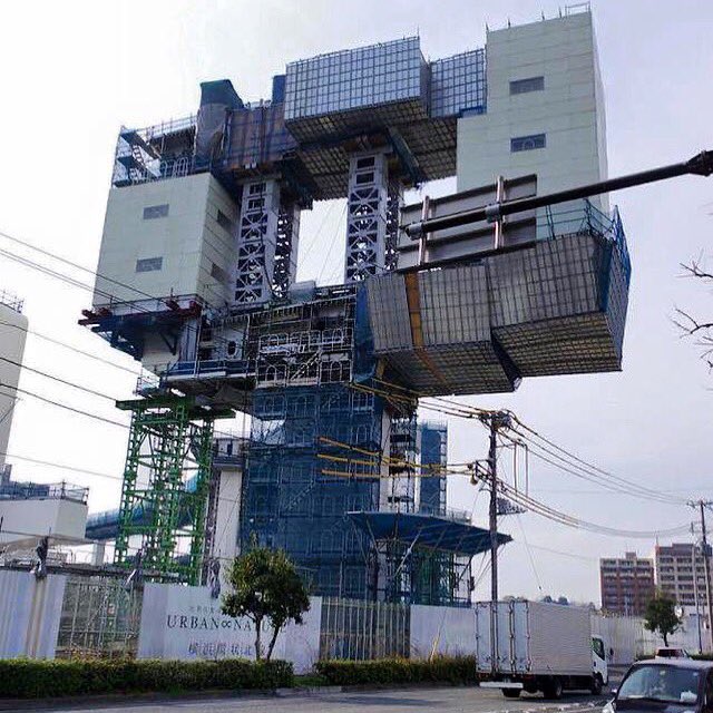 Even construction sites in Japan can be incredible objecrs of aesthetic delight... Mobile construction gantry for an overhead high speed railway line, Yokohama, Japan-Image unknown source