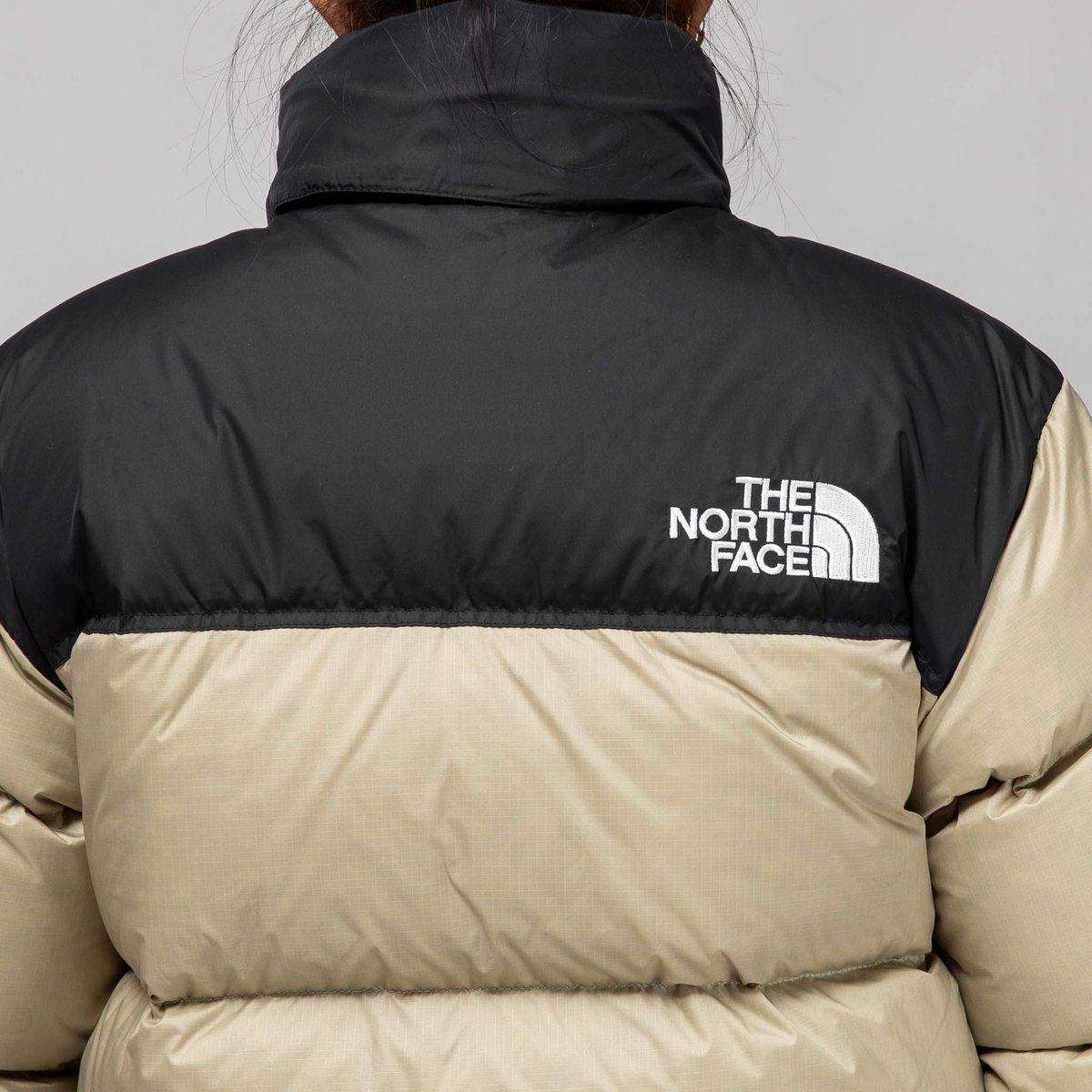 beige north face coat