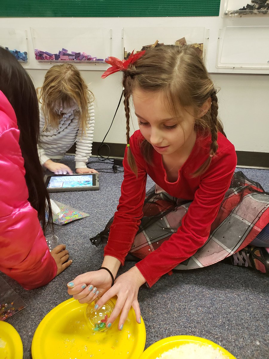 wsmithpes's tweet photo. We took a break from creating our Dinosaur Park to create I Spy ornaments. They can look for Rudolph's nose, a jingle bell, among other holiday things. #plainstigers https://t.co/cNeRUlm3Tj