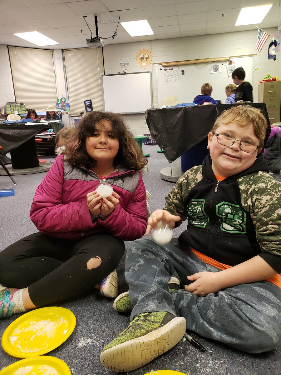 wsmithpes's tweet photo. We took a break from creating our Dinosaur Park to create I Spy ornaments. They can look for Rudolph's nose, a jingle bell, among other holiday things. #plainstigers https://t.co/cNeRUlm3Tj