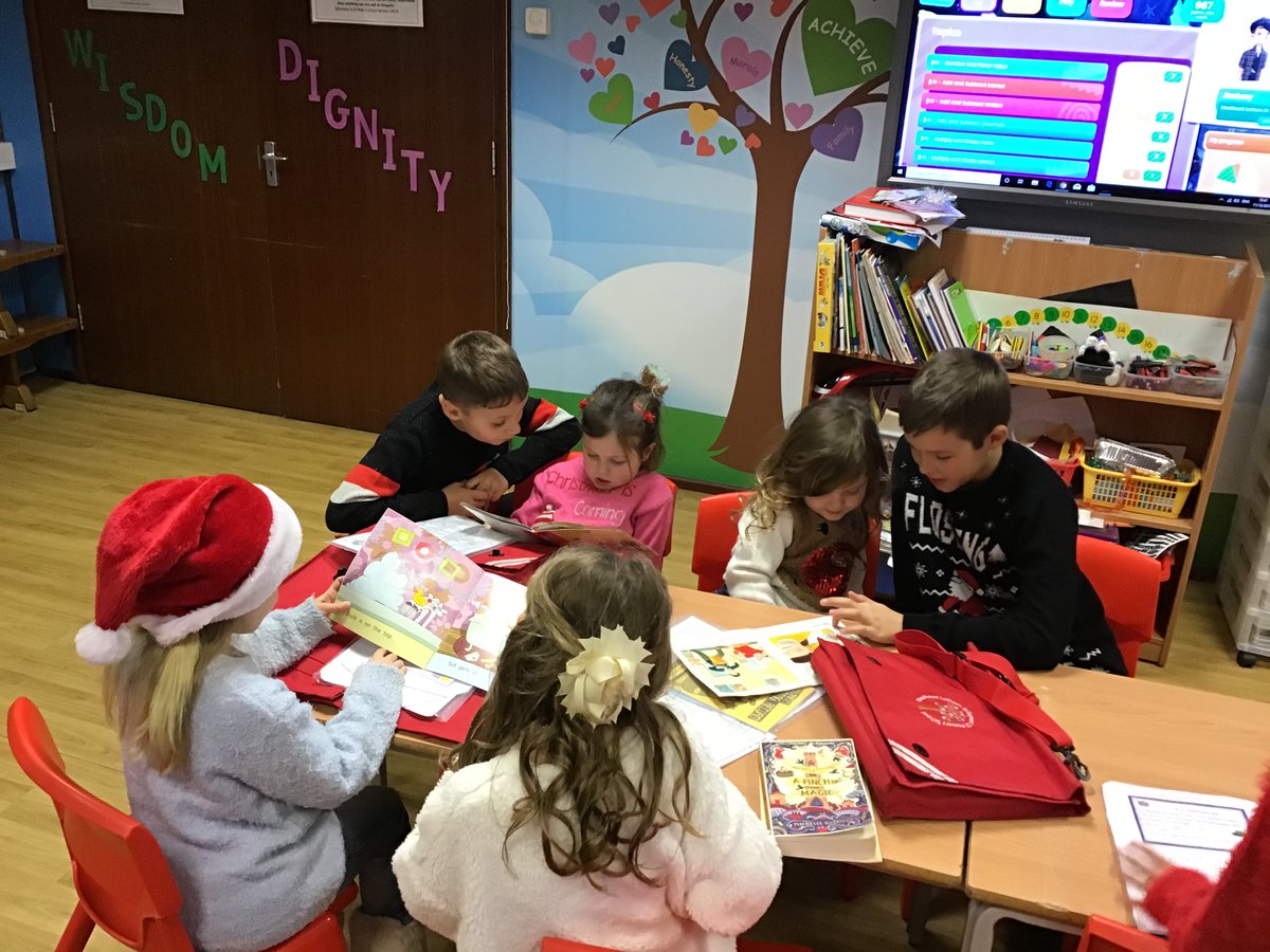 LathomSt's tweet photo. Some of our older children helping the younger ones with their reading in homework club. We really do have the best pupils. #workingtogether #homeworkclub #service #christianvaluesinaction @LivDiocese @lancslpds https://t.co/WGPwv4TaBi