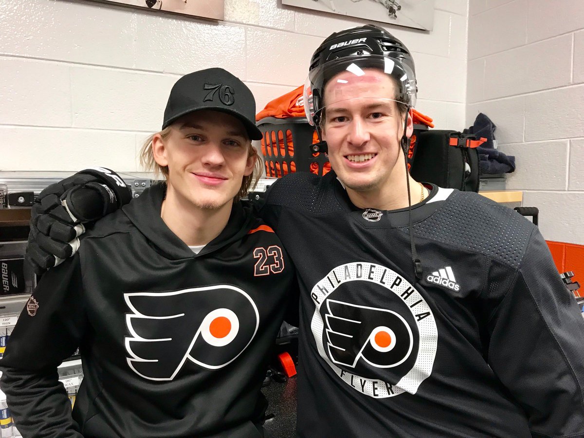 BroadStBull's tweet photo. Oskar Lindblom (left) and Robert Hagg chat in the locker room Tuesday. Seeing Lindblom lifted the team’s spirits, AV said. Lindblom will have cancer surgery at Penn. Photo: Zack Hill. https://t.co/MsE79hGEJG