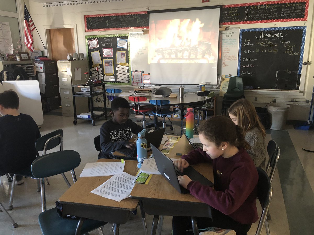 4RoederLSS's tweet photo. Who says you can’t make a classroom cozy?  Writing gingerbread cookie persuasive essays by a crackling fire.  @4RoederLSS @ExeterLSS https://t.co/DB6Aus4Gyv