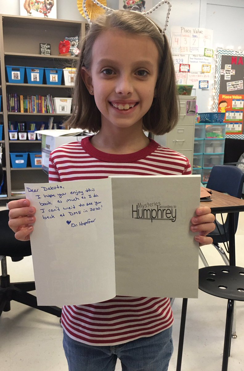 DrHepfner's tweet image. Our hands are sore, but our hearts are full. Mrs Powers and I wrote a personal message to each of our students in their own book and wrapped them for the holiday season! We got to finally give them today! It was hard to keep that secret! #dmerocks