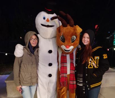 NewtonSchoolsKS's tweet photo. Some of Newton High School’s business students got in the holiday spirit by volunteering at Botanica! They helped monitor the line at the carousel and dressed up as Frosty the Snowman and Rudolph. 
Way to go! https://t.co/x9OoHe3wjU