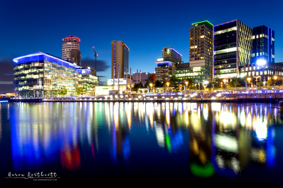 AaronNorthcott's tweet photo. The Quays in #Manchester, UK are beautiful by night - illuminating the #NightSky and dark waters of the river Irwell. They’re worth exploring if you’re travelling in the North of England! 

#NightPhotography #LongExposures #NightTimeWorld #ShootbyNight #TravelPhotography https://t.co/ZNvz1bd4hE