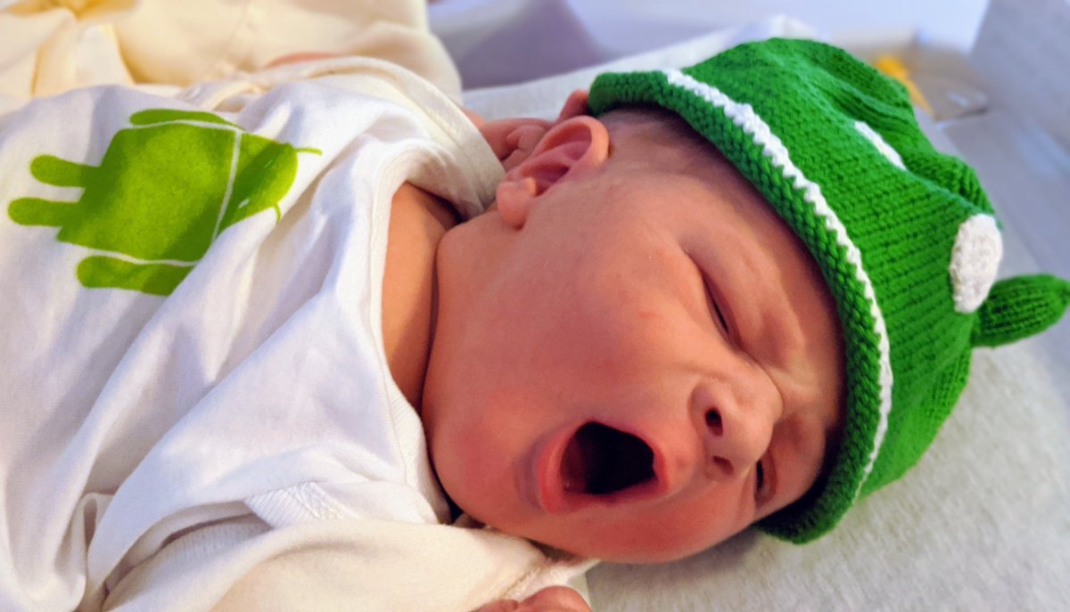 Baby wearing #Android onsie and matching hat