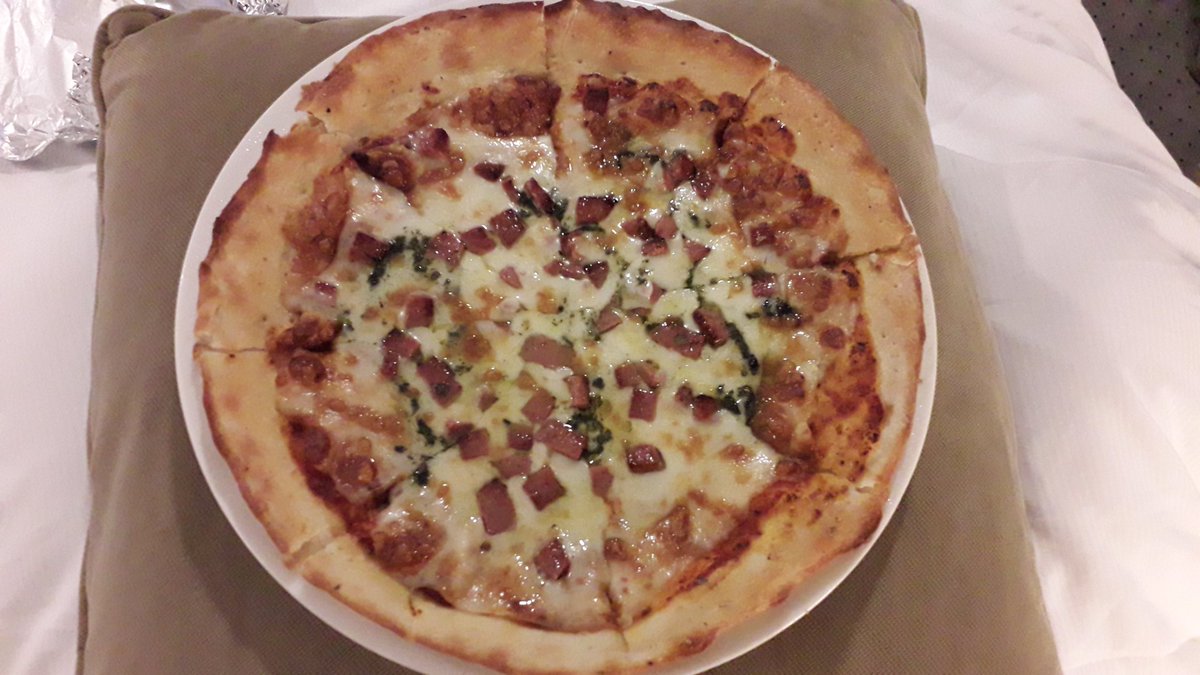 StaceyPonsford's tweet photo. Hubby did good! Hes out at the football and I'm indoors eating pizza 😋 #Doha #football #pizza #roomservice https://t.co/Rv3Srnk136