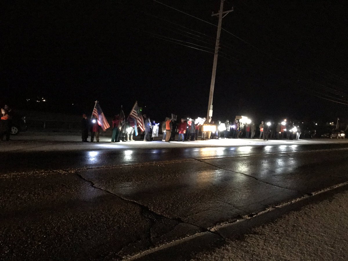 SharonMachias's tweet photo. #ImpeachmentEve #NotAboveTheLaw #mainersForImpeachment                  On the dike in Machias Maine 12/17/19. More than 50 people turned out in 28 degree weather.  Population of Machias 2000 but people showed up from towns 45 miles to the east and 30 miles to the west https://t.co/wK1ChApmxP