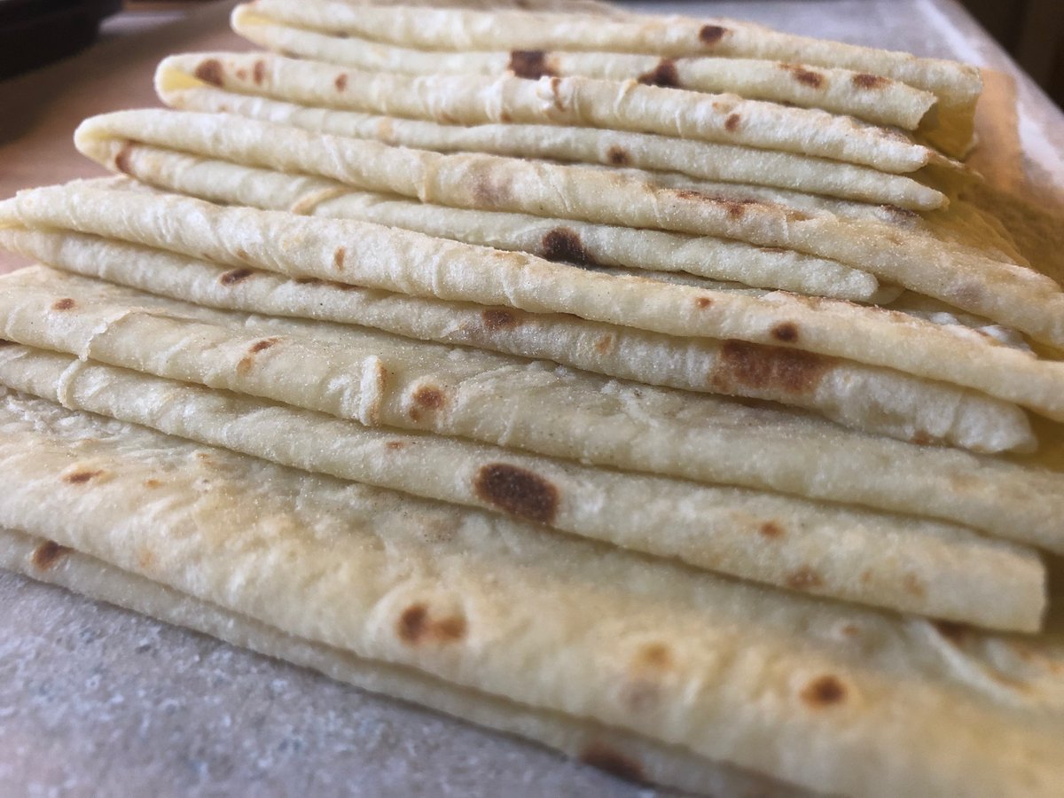 UncleBronto's tweet photo. Dino wife, @RexAunt, is busy at the food cart rockin' out to Christmas tunes while banging out dozens upon dozens of orders of #lefse.  Shoutout to the entire @vikingsoulfood crew! https://t.co/3oULOQbMbc