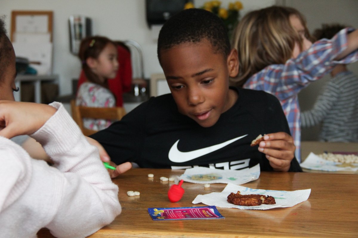 TCS_Atlanta's tweet photo. Celebrating holidays the #TCSWay 💙Yesterday, #TCSAtlanta's first graders held a holiday extravaganza! Students spent time learning about the traditions of Kwanzaa, Hanukkah, and Christmas. ❄️ https://t.co/3FMYA59B41
