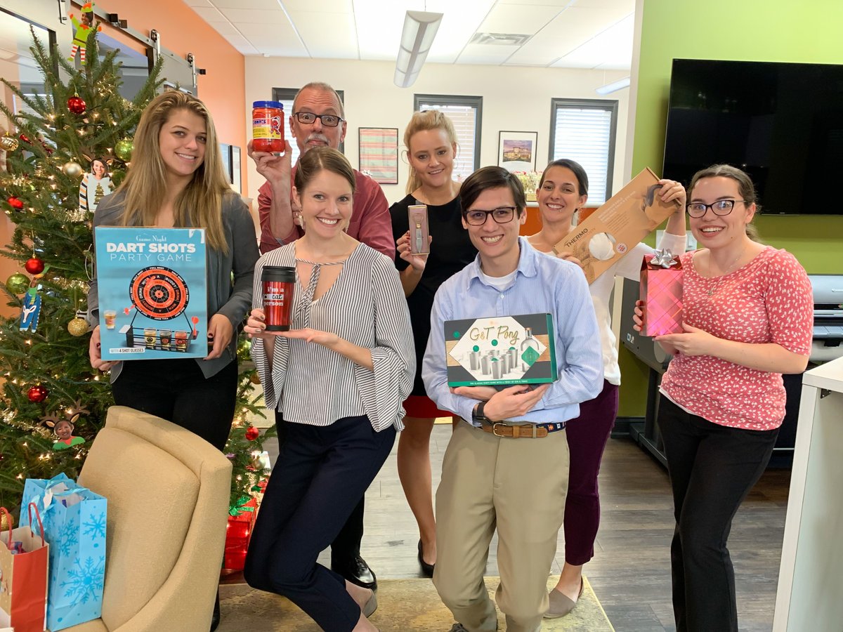 UnitedLandmark's tweet photo. We had an exciting ULA Holiday Gift Swap today in the office! Take a look at some of these wacky and unique gifts team members ended up with 🎁

#FaLaLaFunAtULA https://t.co/YYT7ldVa39