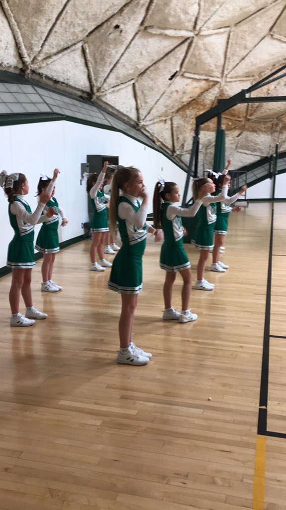 lifeinperry's tweet photo. 5th grade cheer working hard to get the crowd into the game.  Coach Lynton and the girls doing a great job! #TheBigGreen #pccs https://t.co/hHR8E9E0hF