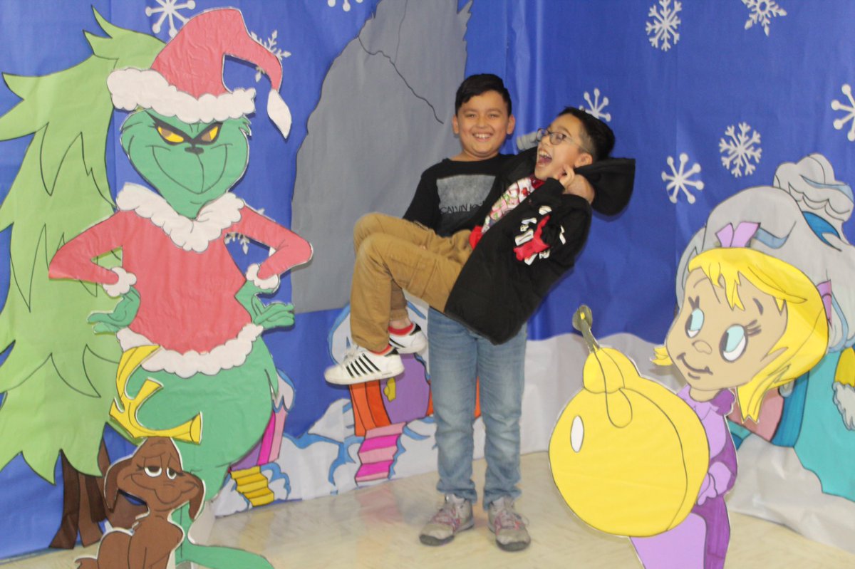 DROMO1412's tweet photo. It’s the the the THE GRINCH! 🤣 Happy Holidays🎄 -❤️ Miss Romo’s 5th Grade Class https://t.co/YvLTSedsQO