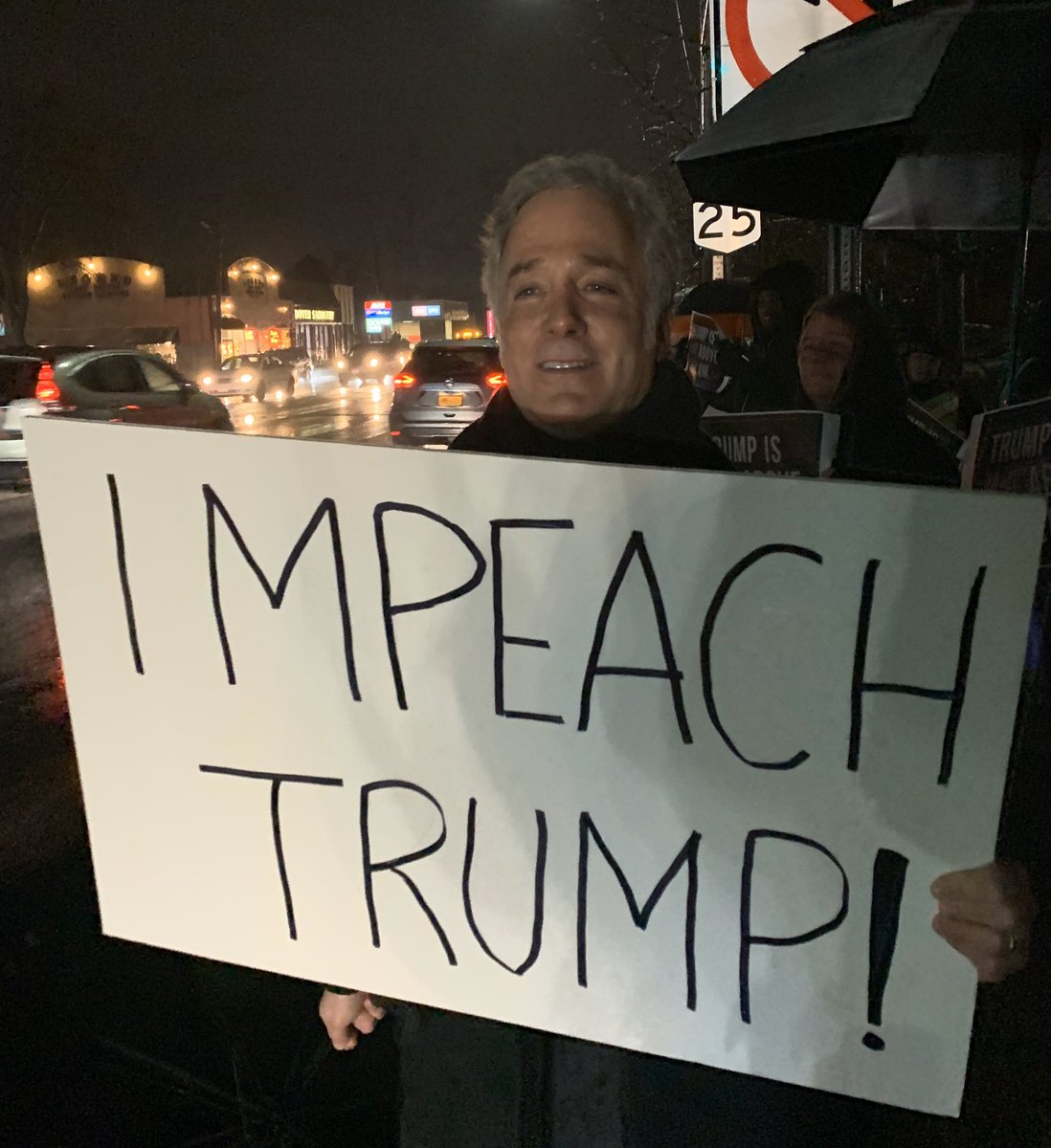 joncoopertweets's tweet photo. Over 200 patriotic Americans turned out for the impeachment rally in Huntington, NY. A steady rain and bitter cold temperatures didn’t do anything to dampen our enthusiasm. Great to see all the cars honking in support!! ✊
#ImpeachAndRemove #ImpeachmentEve #NobodyIsAboveTheLaw https://t.co/fWLxSMXAbk