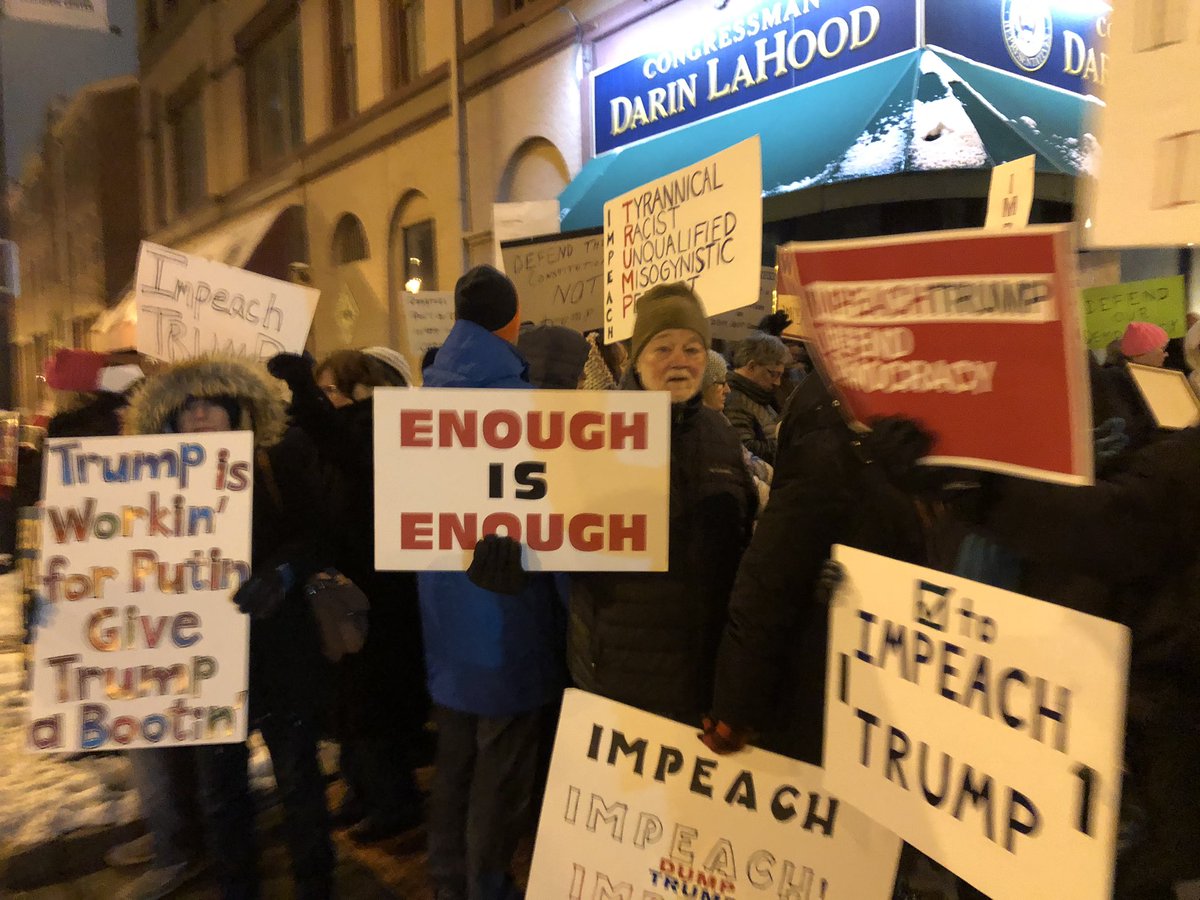 IndivisibleSPI's tweet photo. Sprinfield Illinois packed the sidewalks surround @RepLaHood  office urging he and @RodneyDavis to vote yes on articles of impeachment of Donald J Trump #NotAboveTheLaw #ImpeachmentEve #ImpeachAndRemove #Indivisible @IndivisibleTeam @IndivisibleIL https://t.co/tBD95j4HY6