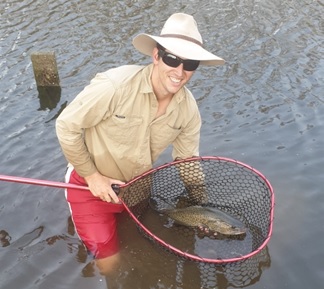 Photo: checking fish health in the Mehi. 