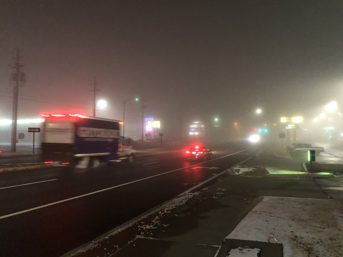JessSchaer's tweet photo. Visibility is bad tonight. That stoplight in the background is Range Line and 4th. Careful out there, folks! #MOwx #4statewx https://t.co/mP8dITrU4G