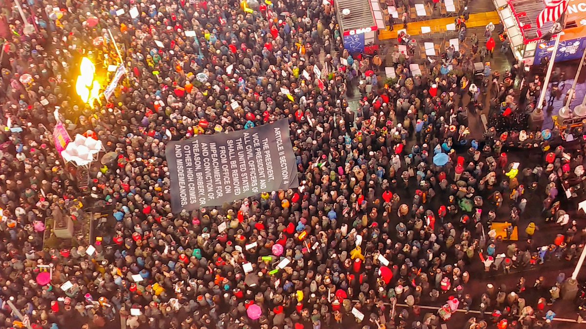 There are thousand of American's who have taken to the streets to protect our democracy. This is an amazing photograph taken over Trumps' home state of New York in Times Square. #TimesUp #ImpeachmentEve