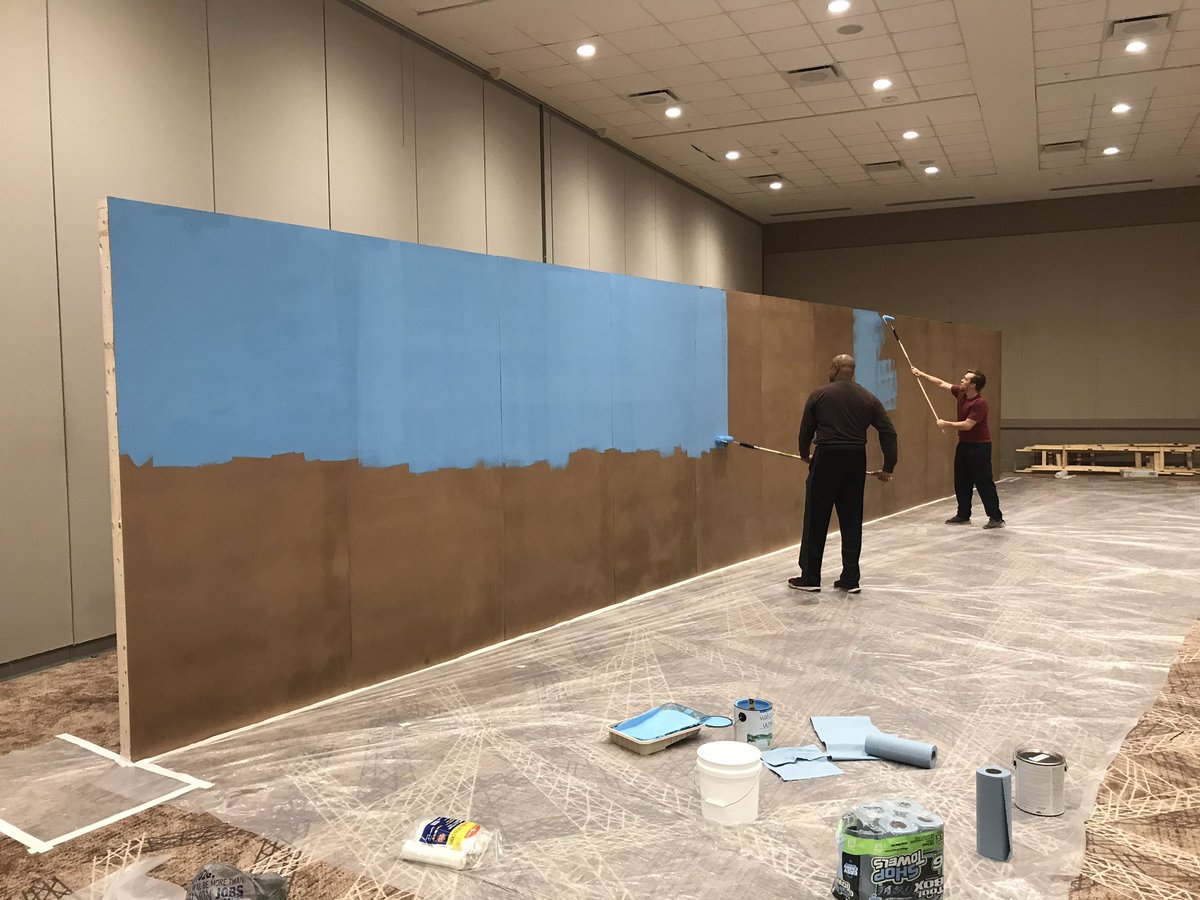 christmas4city's tweet photo. The late night shift goes to the artists! Veteran CFTC artist Leo Rucker along with new artist Jonathan Dockery are putting the base layers for a 48’ x 8’ mural to be painted by the community at #CFTC2019.
Don’t miss it in Winston 2 at the Benton on Thursday night!! https://t.co/XF2pj9SAmg