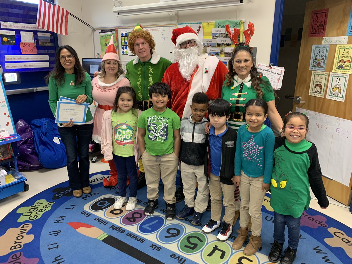 eisd_it's tweet photo. I know him...I know him! It was our annual read a loud for our ECC students and prize patrol for https://t.co/ZRkvTSJ91Z winners. It was such a joy spreading Christmas cheer and seeing the kids get so excited! #Elf #DetailsMatter #EdgewoodProud https://t.co/t8kOva3k1N