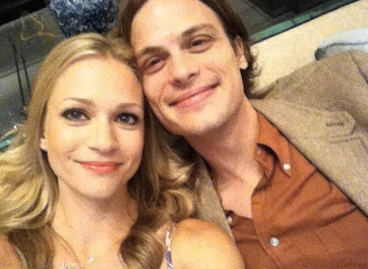 two awkward babies trying to take a not so awkward photo