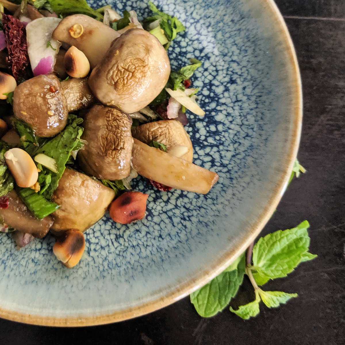 #cookeveryday 
Back to trying out recipes... This one's a spicy mushroom salad from the amazing Ritu Dalmia <a href="/ritudal/">Xr Dalapati</a> - it's missing the shiitake mushrooms but so good anyway...Don't miss my pretty plate from @sienna_store ! Happy cooking, ya'all! #GetOutEatIn  #healthyfood