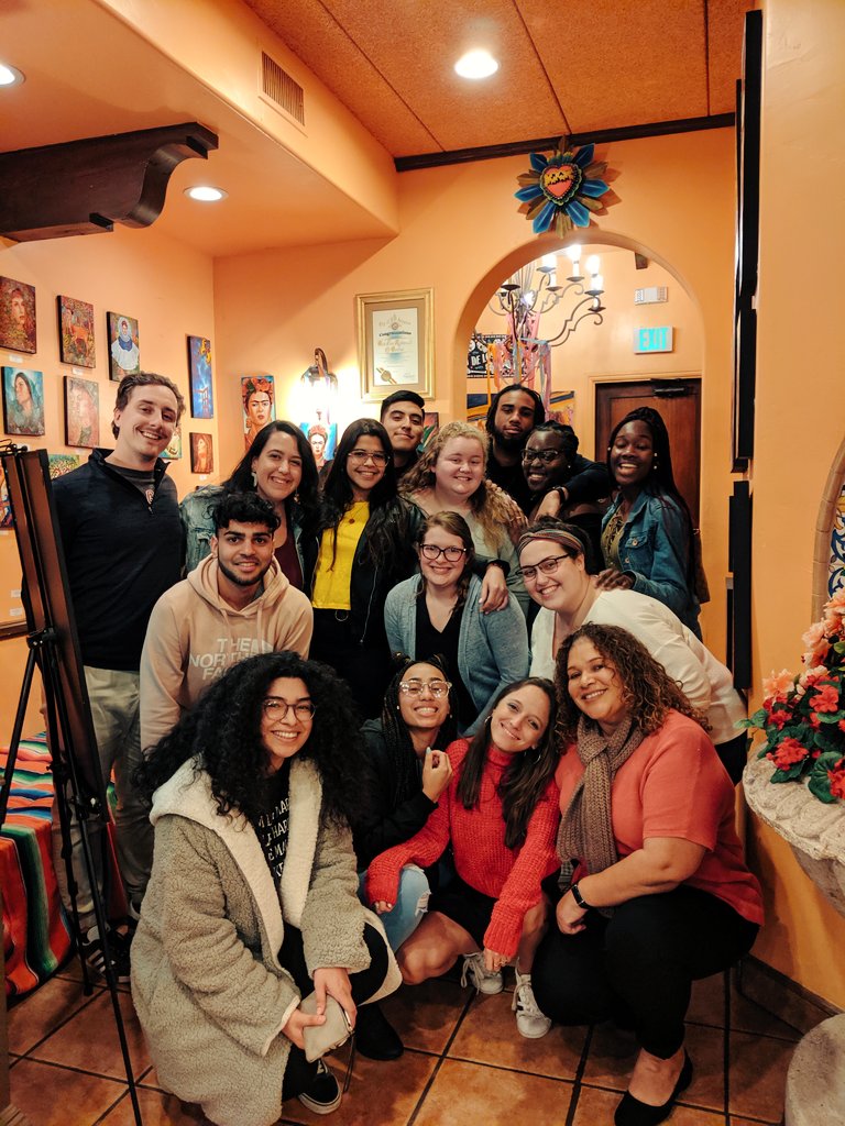 regisministry's tweet photo. After a day of serving food at @URM, talking about restorative justice, and working with @DoloresMission Underwings after school program - our delegation enjoyed a dinner with our @RegisCollege_MA students and alums in Los Angeles 🦁 #ServeWithPride https://t.co/npOCpGElzn