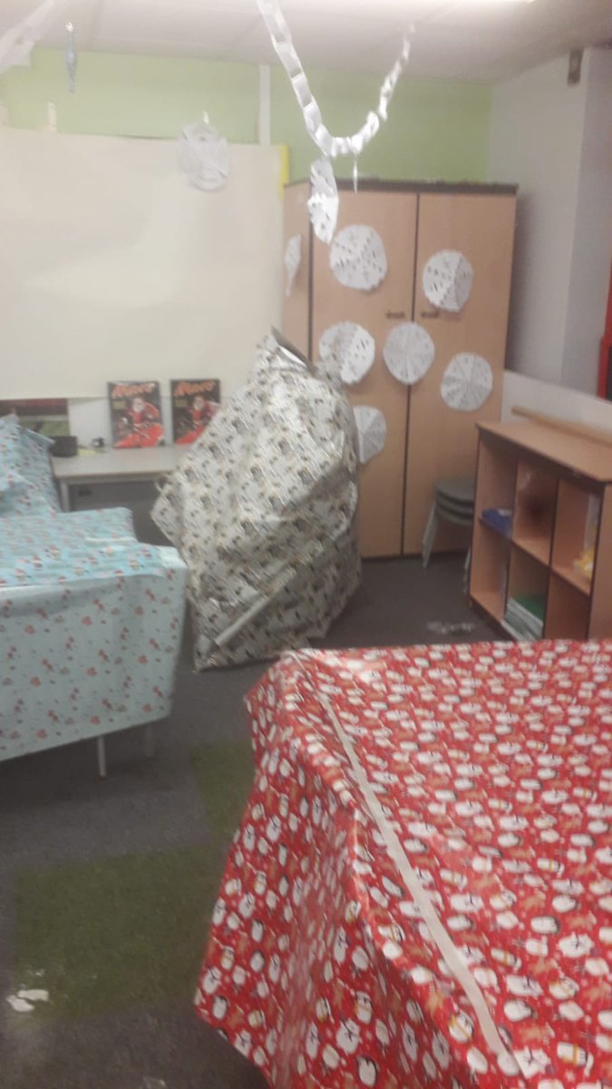 Year3MFPS's tweet photo. He passed through the six classes at Milefield Primary, through the sea of swirly twirly children, and then arrived to cause mayhem in Year 4, even wrapping up Miss G! (He did leave us some Christmas presents though in our Viking ship!) #Garytheelf #Uptonogood https://t.co/wrSc3uUsLR