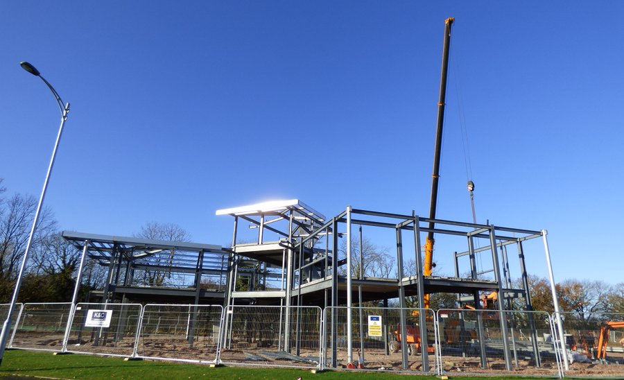 PureHomesUK's tweet photo. UPDATE: Steady progress on the New Pure #Homes and #Commercial Group #HeadOffice at #StAsaph. Structural Steel in place with Upper Floor and Stairs. Tower Crane to lift the cladding. #NewOpportunities @K_C_Construct @bacommercial https://t.co/k2SZ0jnS2b